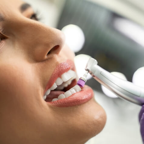 Closeup of patient having teeth cleaned